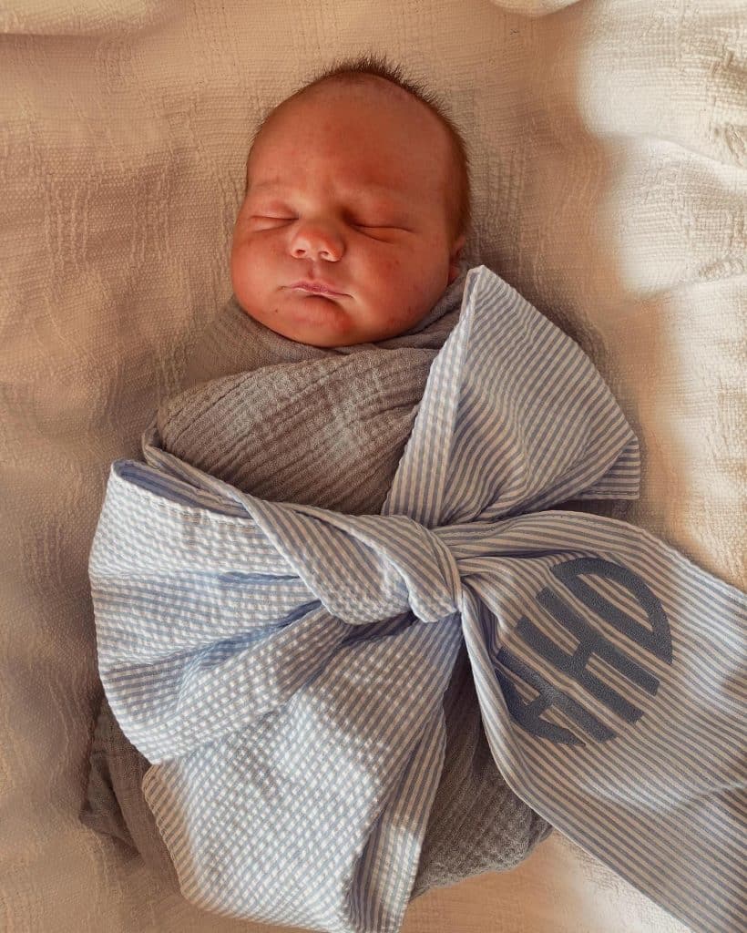 Newborn baby wrapped in a blanket after Confident Hypnobabies Induction