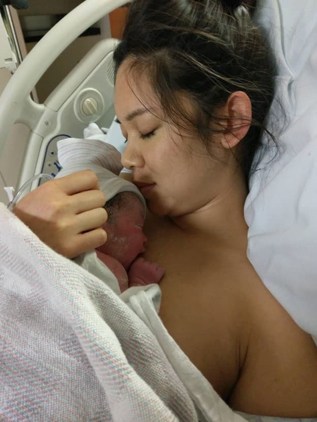 New parent skin to skin with newborn baby