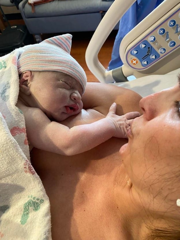 New parent skin to skin with newborn