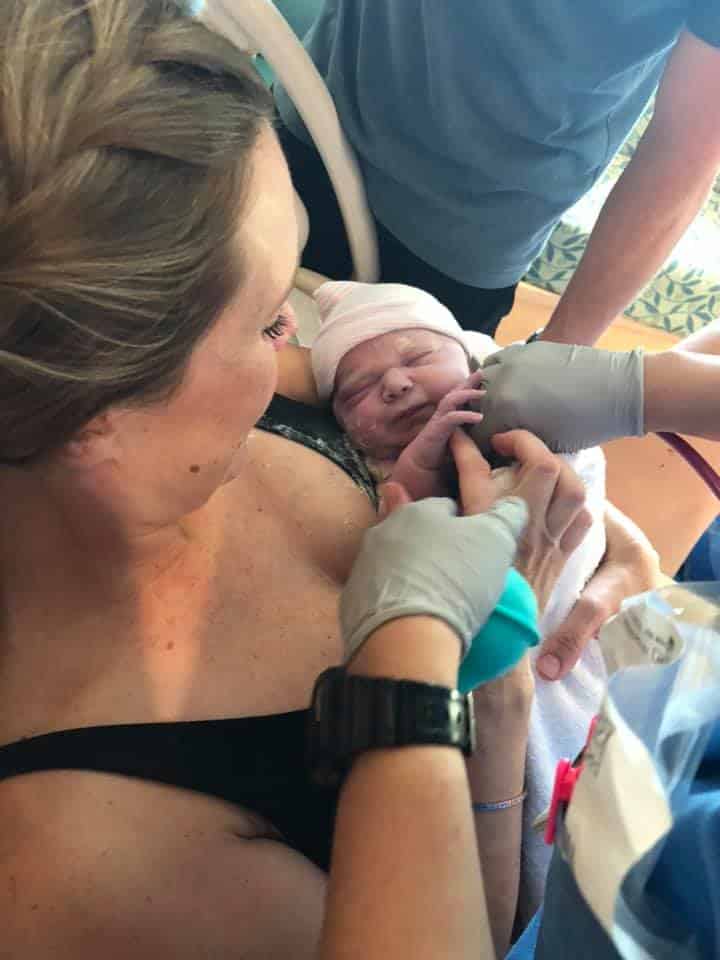 Hypno-mom Lindsey Marie holding her newborn baby