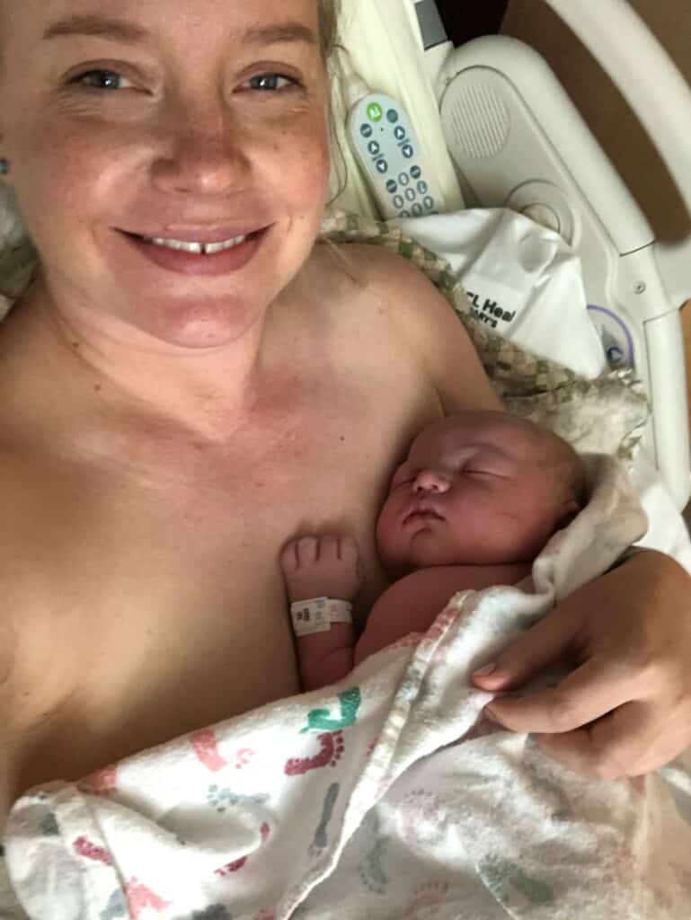 New parent skin to skin with new baby