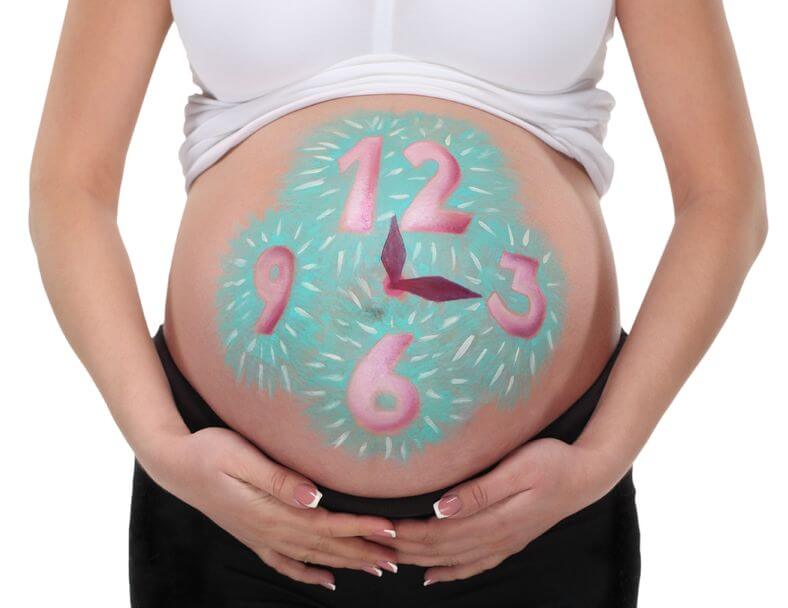 Mom w-Clock on Belly 2