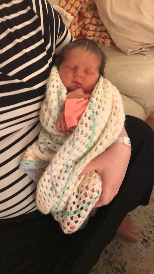 Hypno-mom holding newborn baby