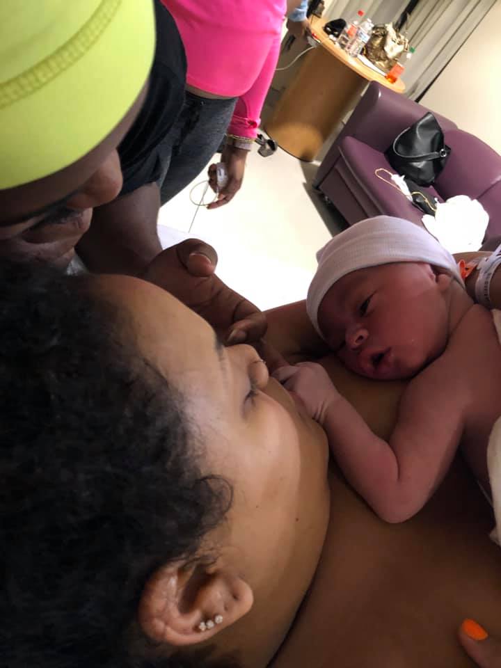 Hypno-mom Tsedaye skin to skin with newborn baby.